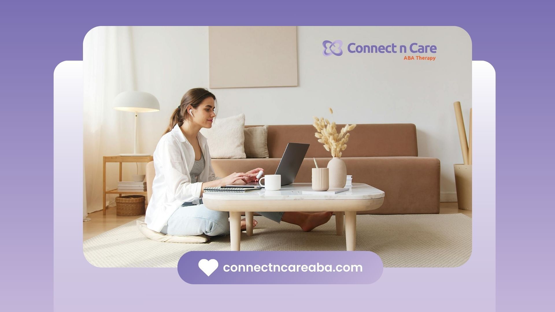 A BCBA student studying a BCBA program online while sitting on the floor in a living room in NC.