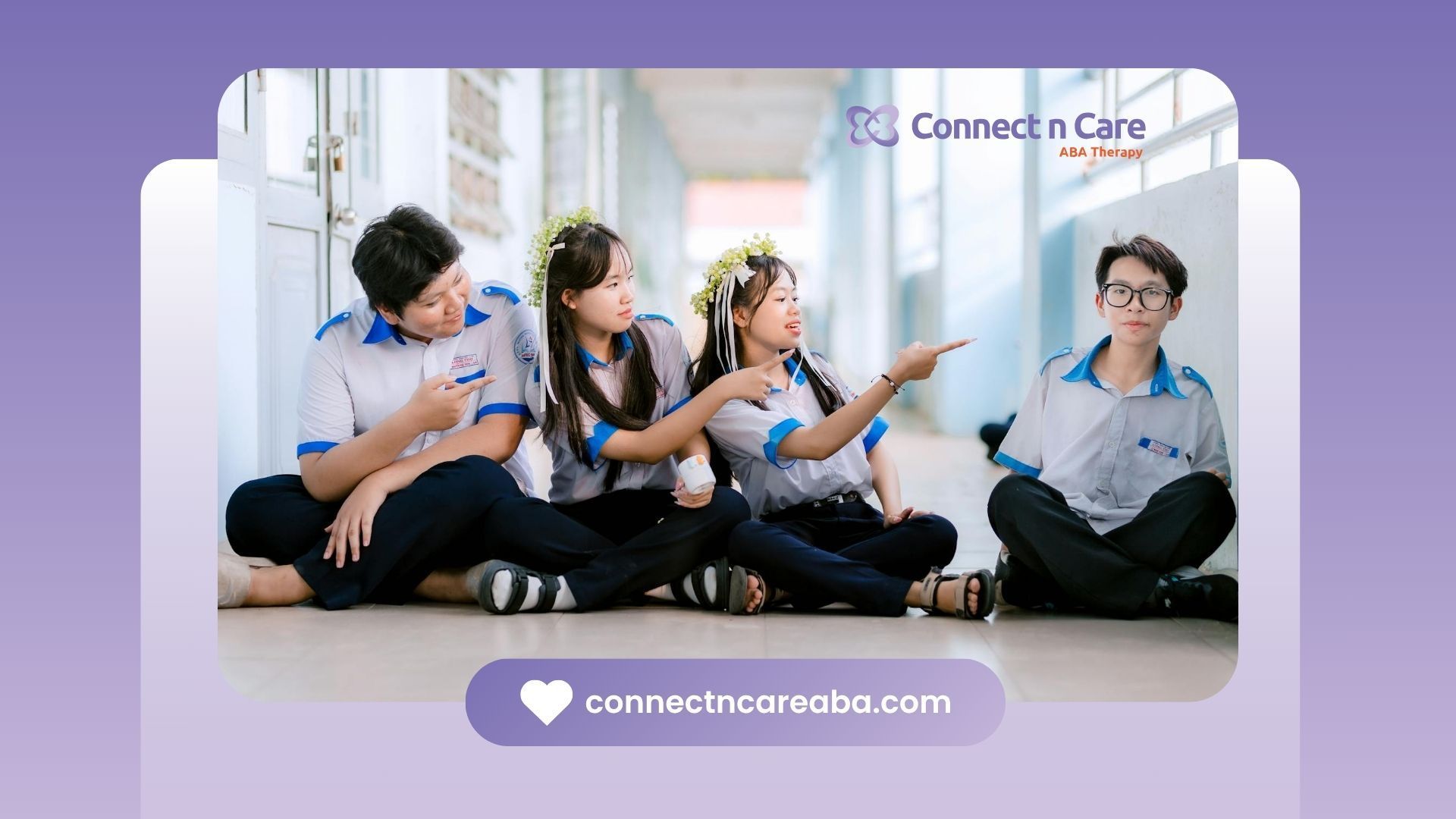 Students pointing at their autistic classmate sitting alone in a school hallway in North Carolina.