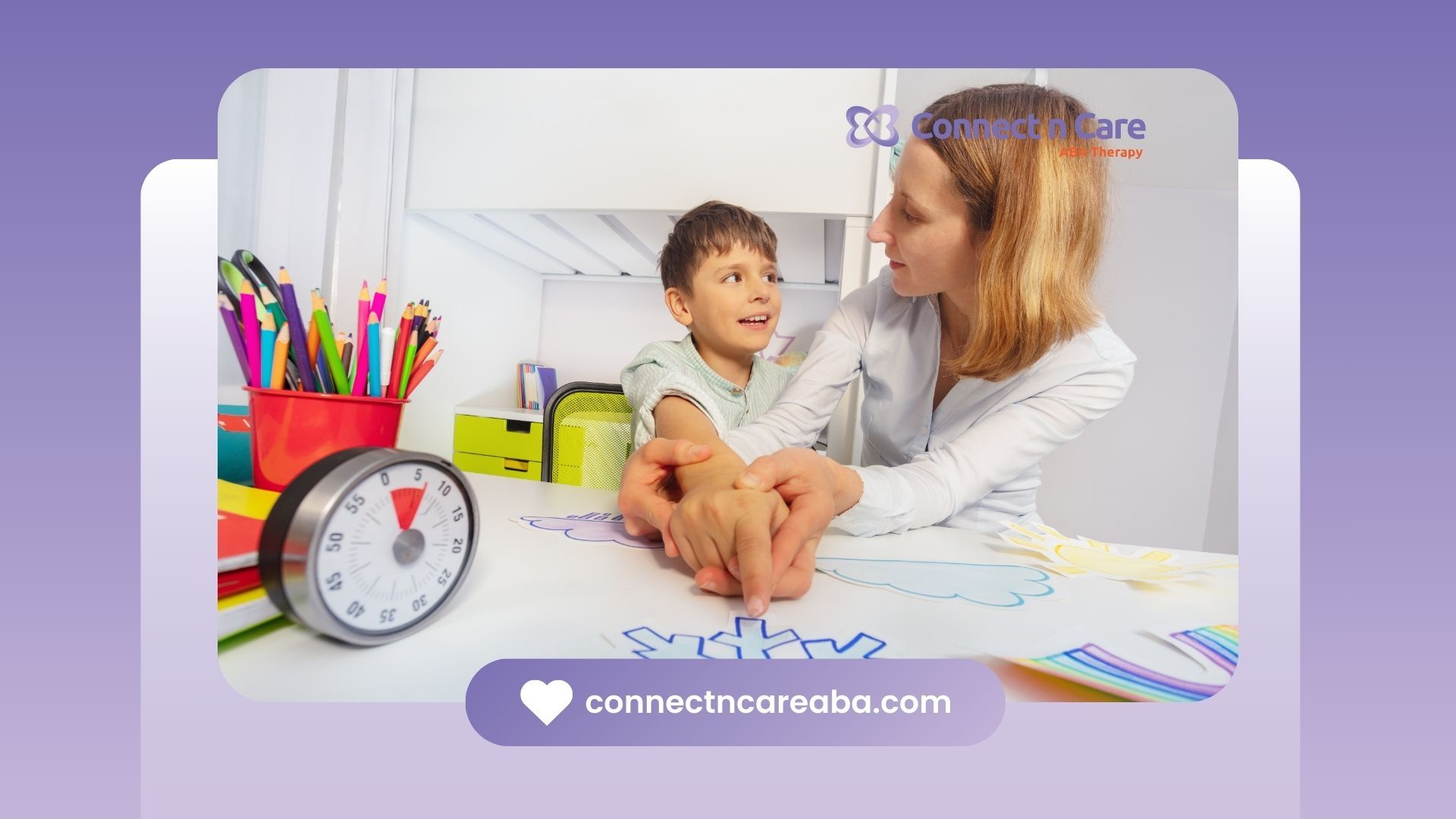 A woman is sitting at a table with a child.