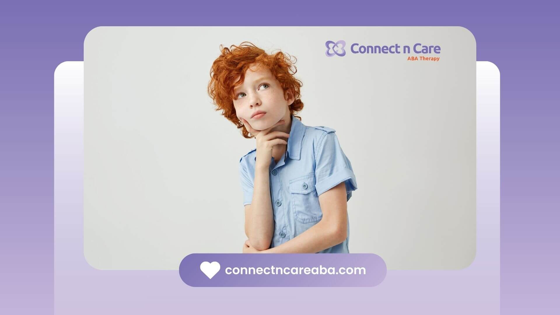 An autistic young boy with red curly hair thinking deeply while wearing a light blue shirt.
