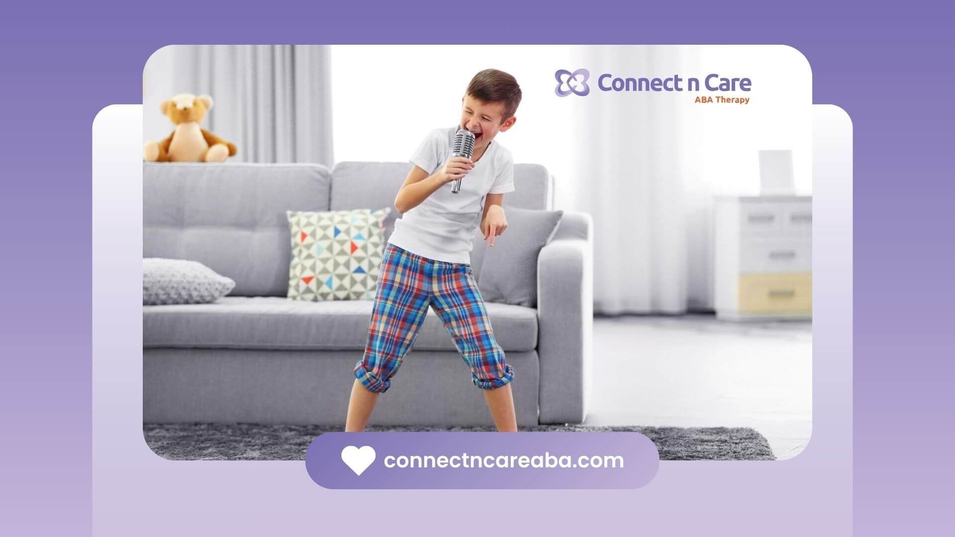 Boy with autism in pajamas singing into a microphone in a living room.