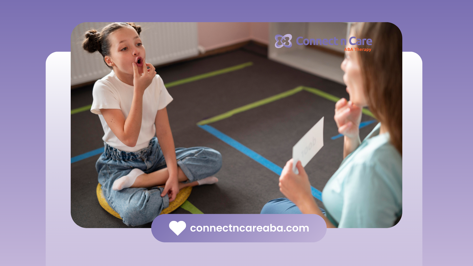 A little girl is sitting on the floor talking to a woman.