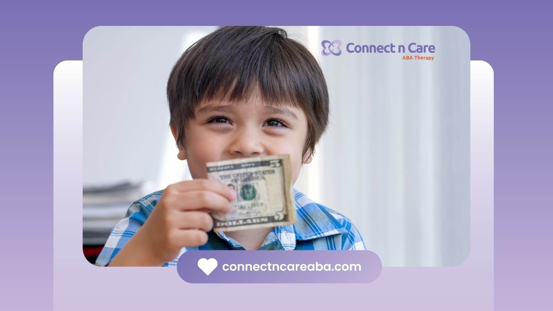 A young boy smiling and holding a $5 bill in his hand, looking happy as he shows it to the camera.