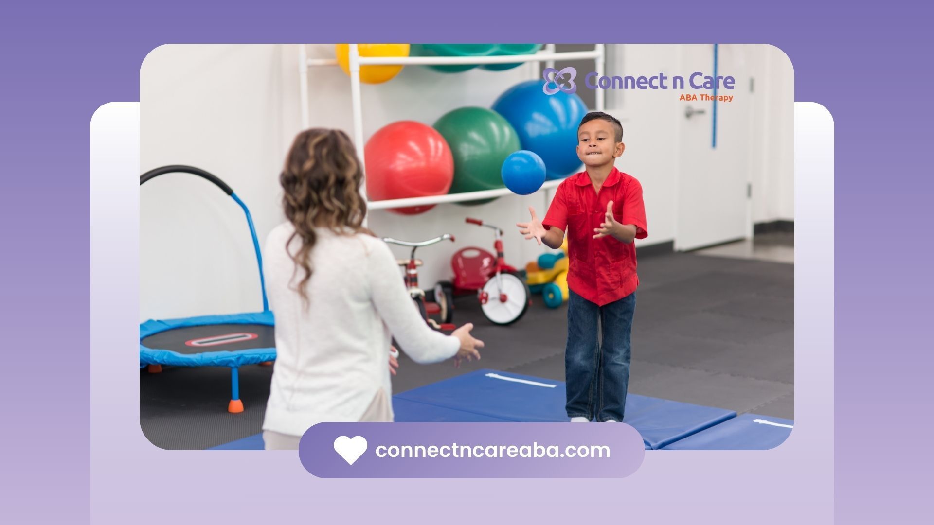 A boy juggles balls with a therapist in a therapy room.