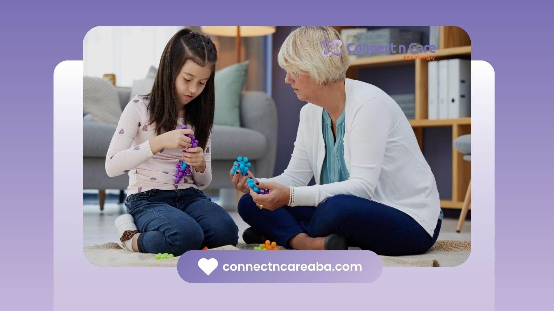 A bcba is talking to a little girl who is playing with a toy in ABA therapy.