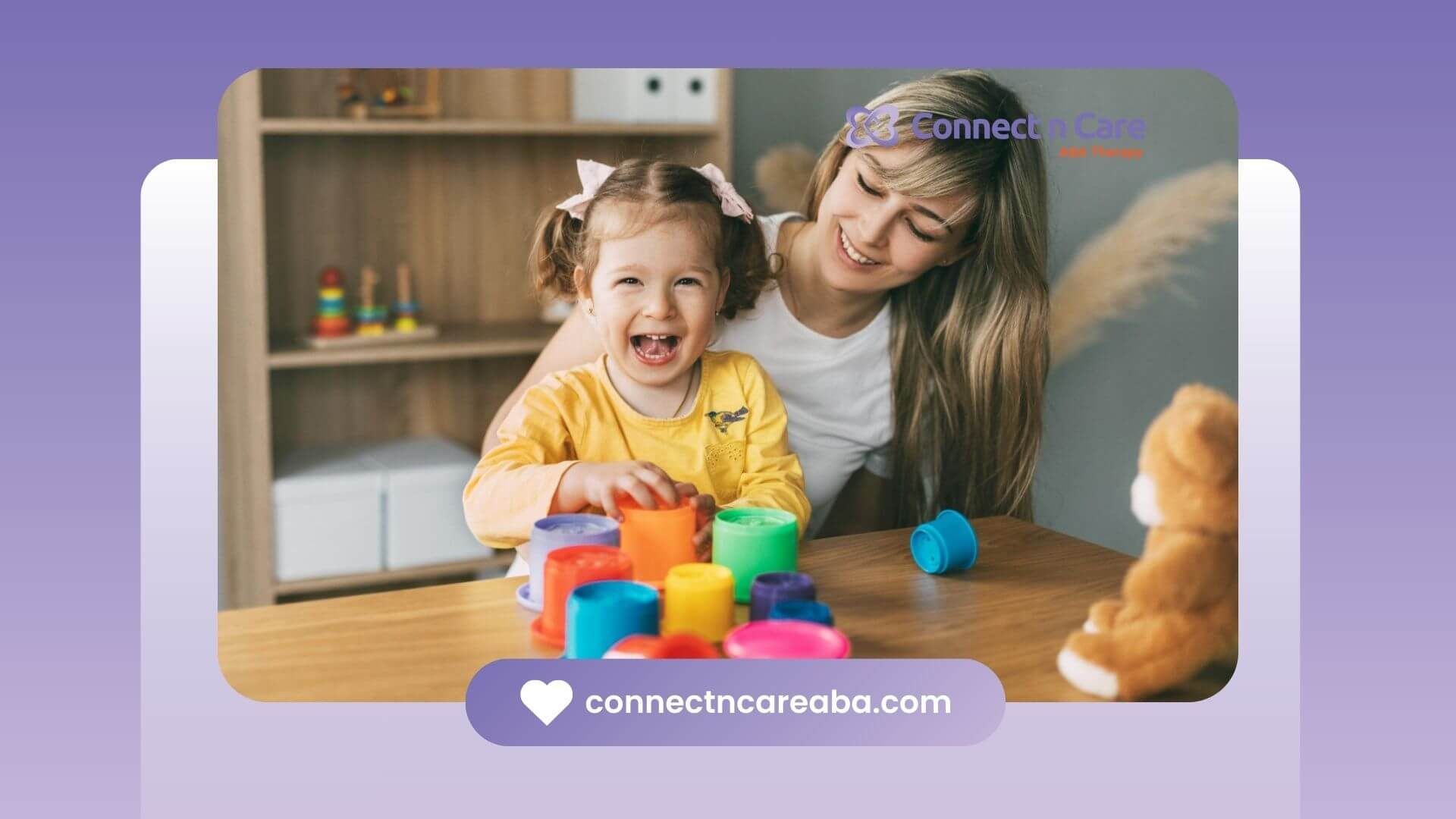 Girl laughing while stacking colorful cups in ABA therapy.