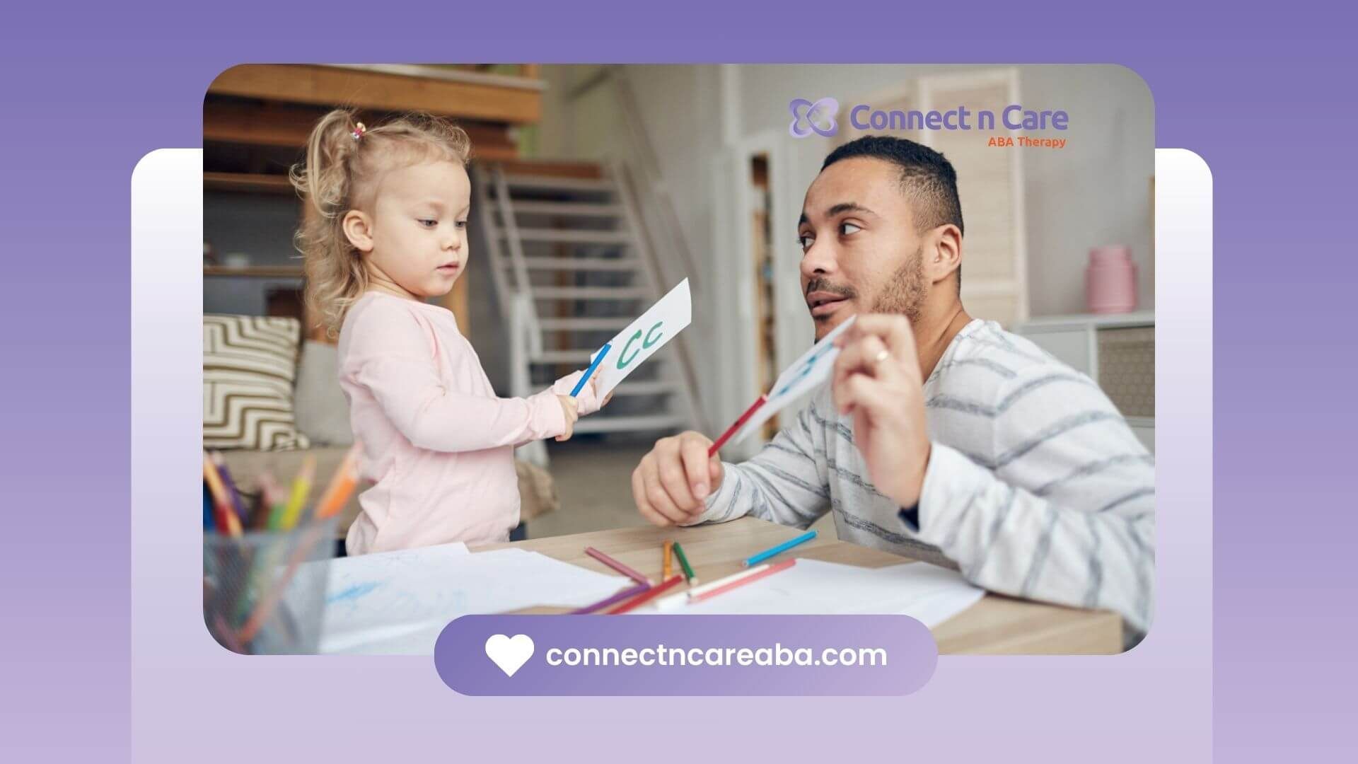 An ABA therapist teaching a young girl letters with flashcards at a table in in-home ABA therapy.