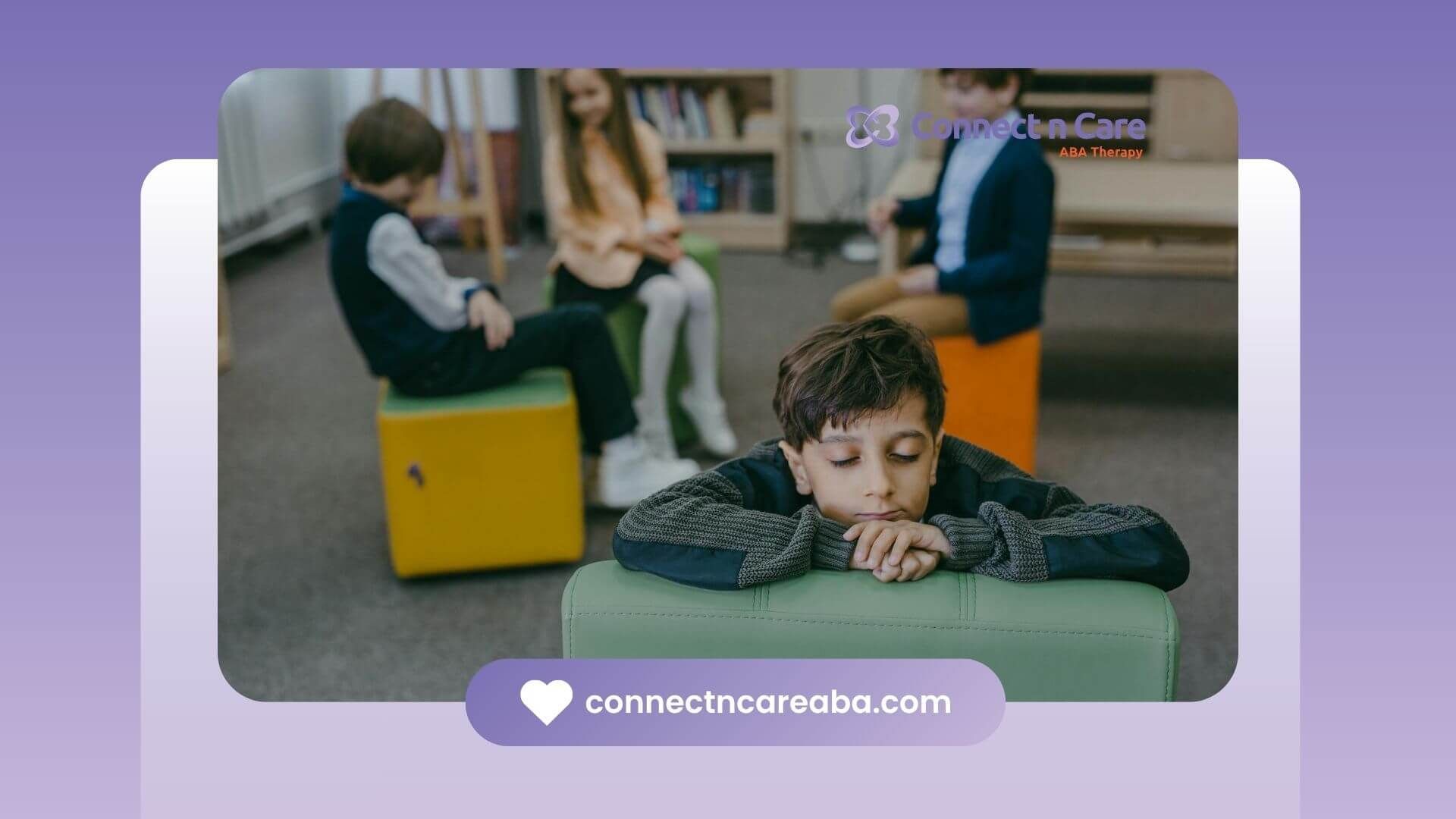 An autistic sad boy sitting apart while other children interact in the background after ABA therapy.