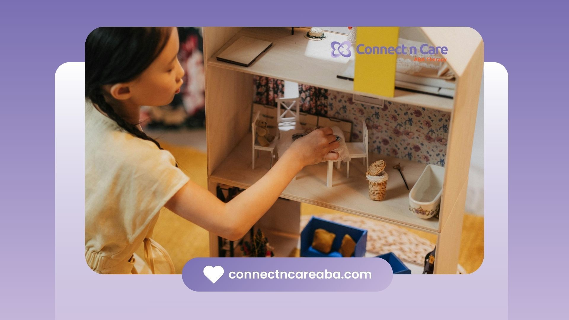 Autistic child arranging furniture in a dollhouse during ABA therapy social story session in NC.