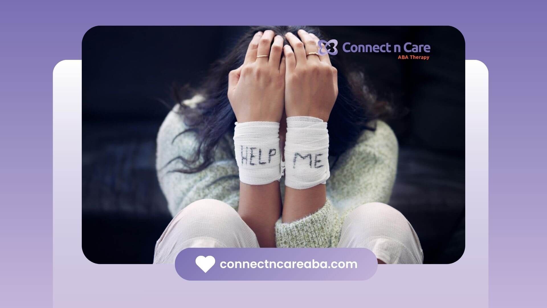 Teen sitting with head in hands showing emotional distress and self-harm warning signs.