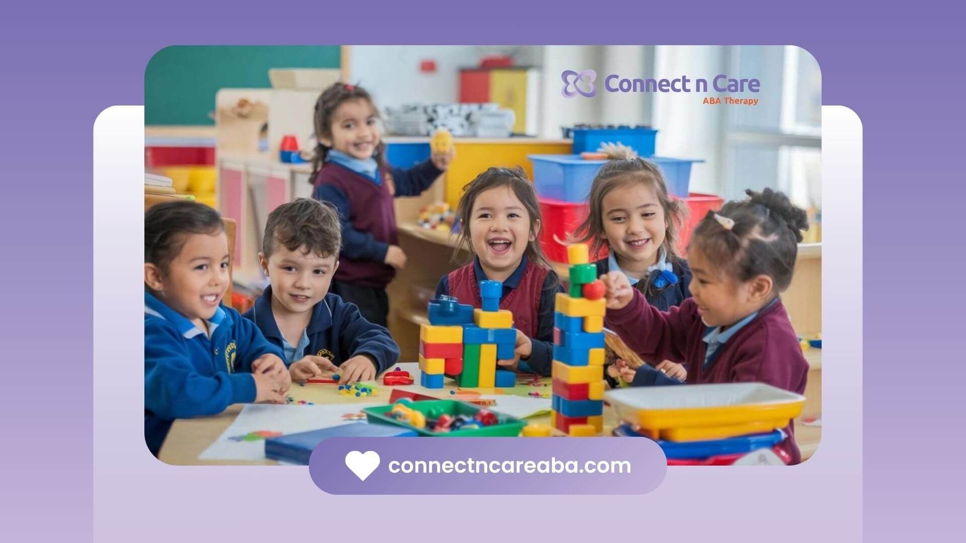 A group of smiling children playing with building blocks in a classroom.