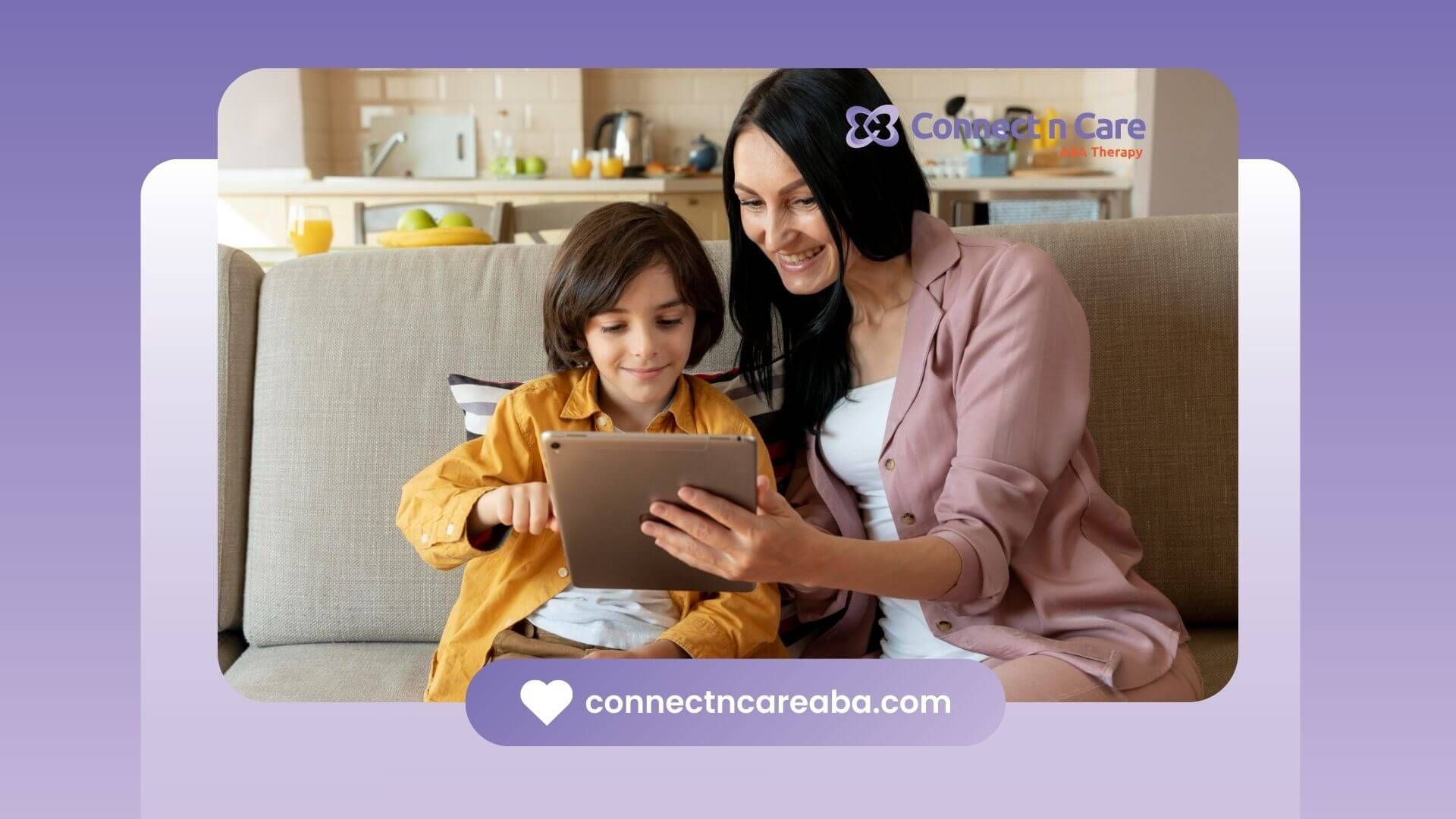 BCBA and child using a tablet on the couch in ABA therapy.