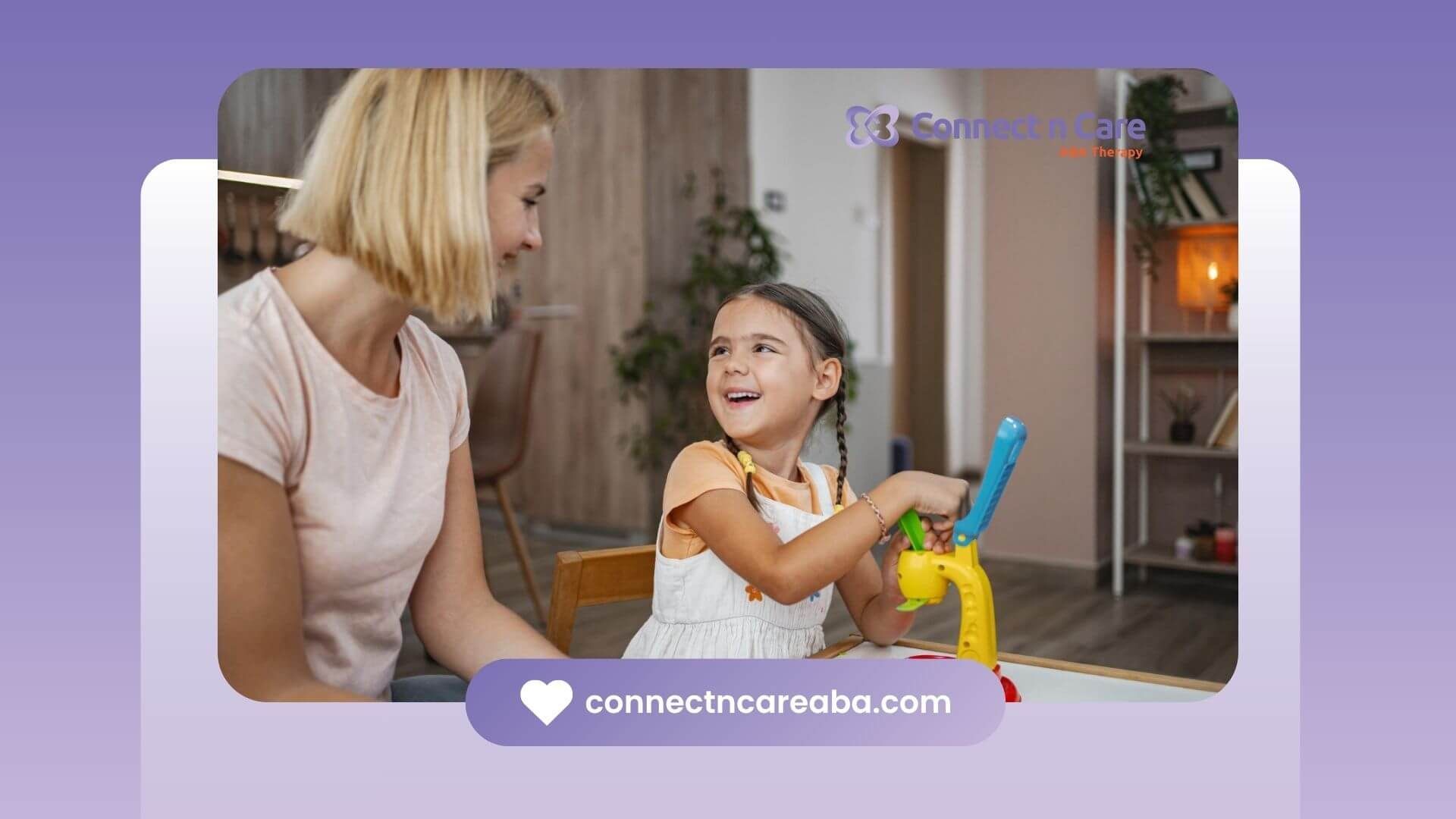 Smiling girl playing with a toy beside female BCBA during ABA therapy.