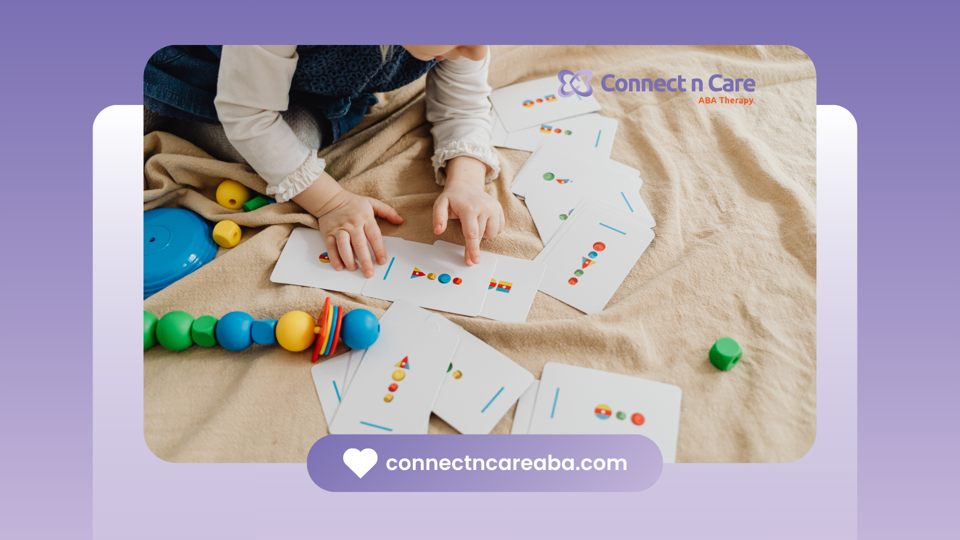 Child playing with cards and toys on a blanket. Connect a Care logo.