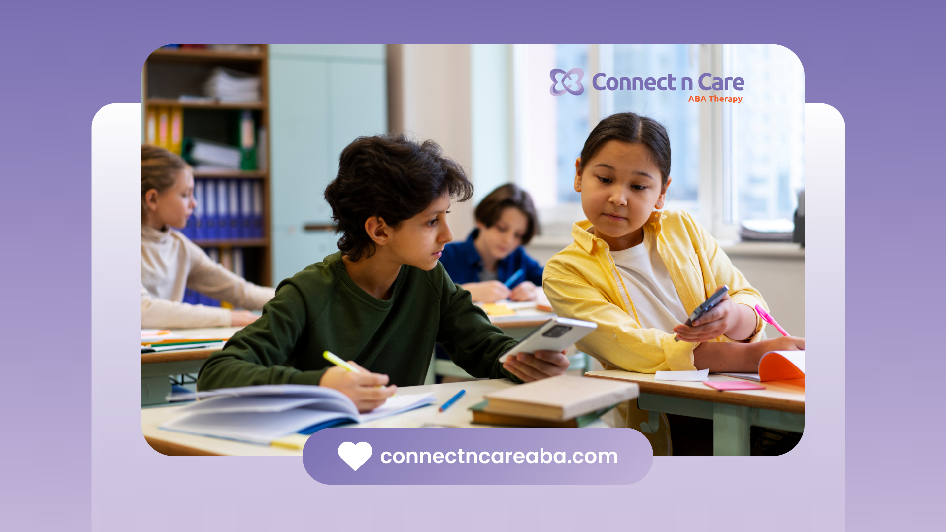 A group of children are sitting at desks in a classroom.