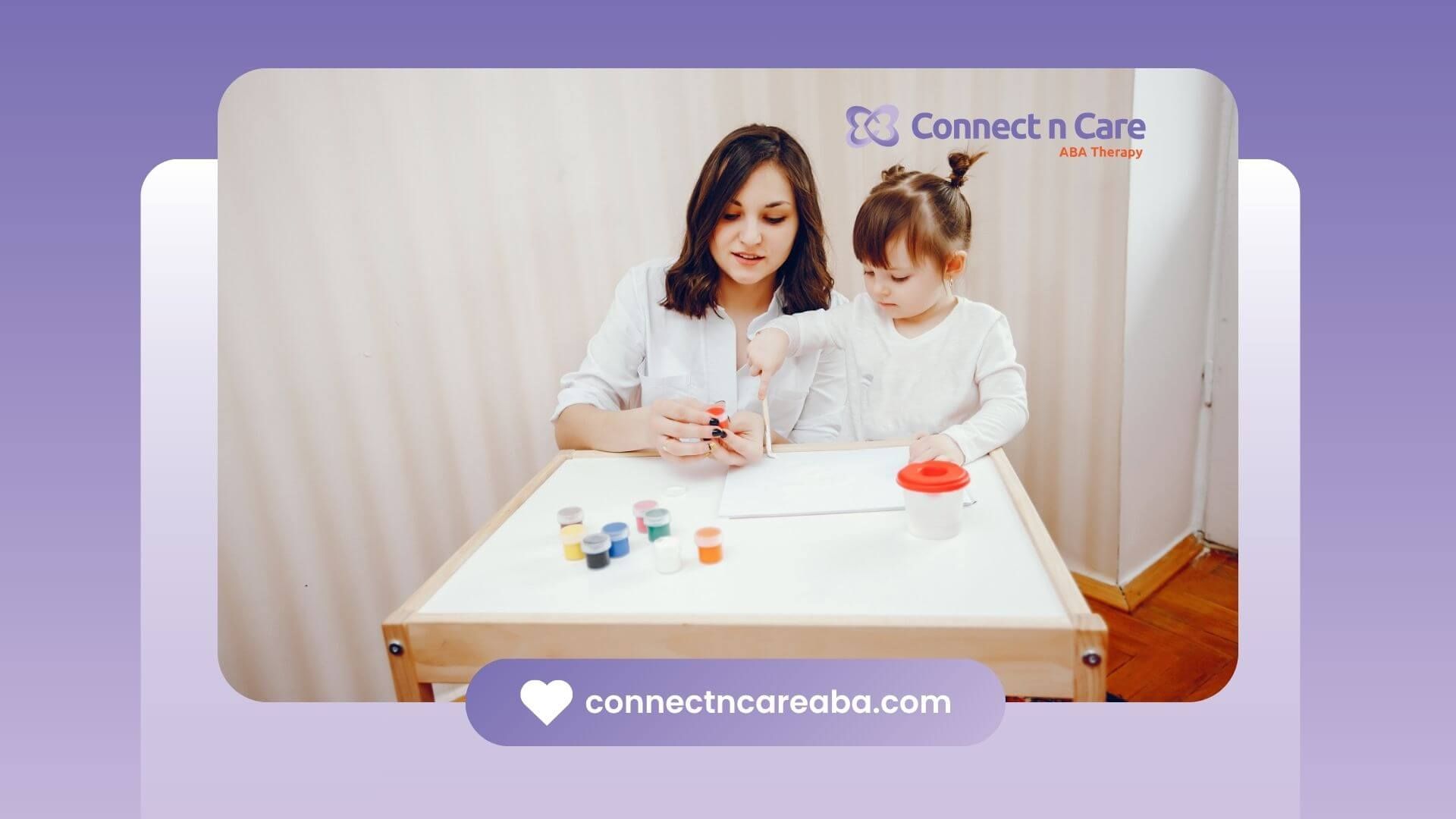Therapist guiding autistic girl in structured therapy activity using paints at table for development