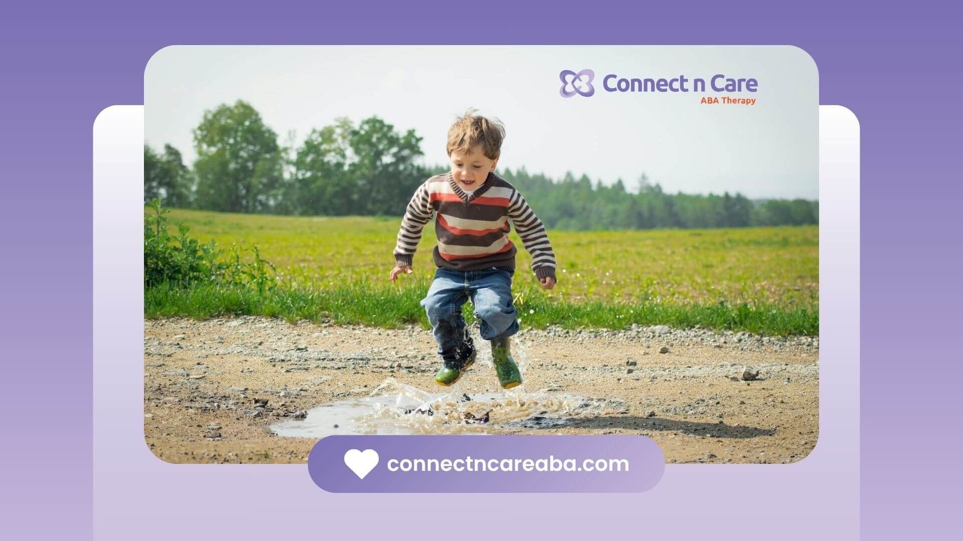 A happy autistic boy jumping into a puddle wearing a striped sweater and rain boots after therapy.