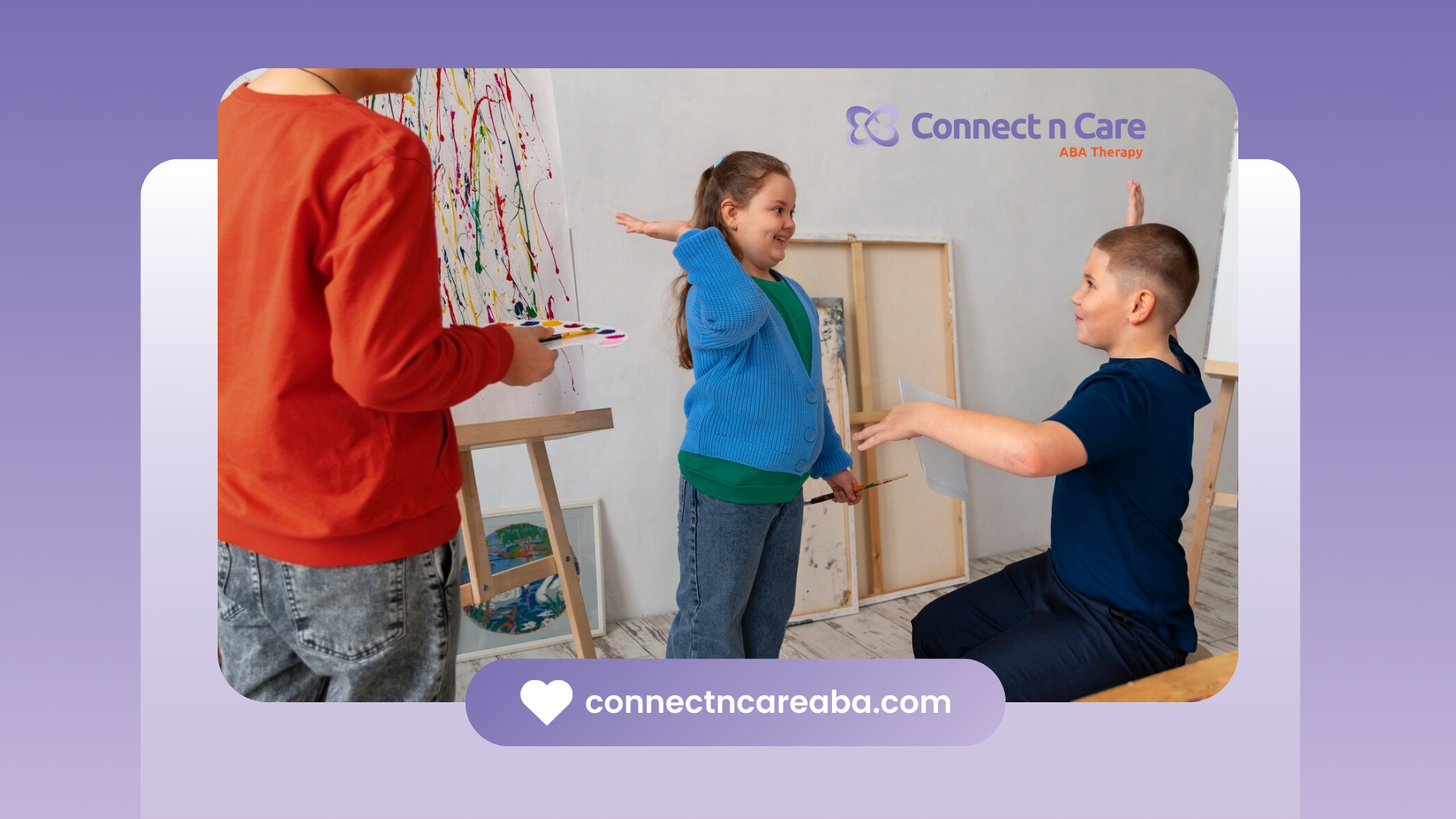 Siblings high-fiving each other during ABA therapy session