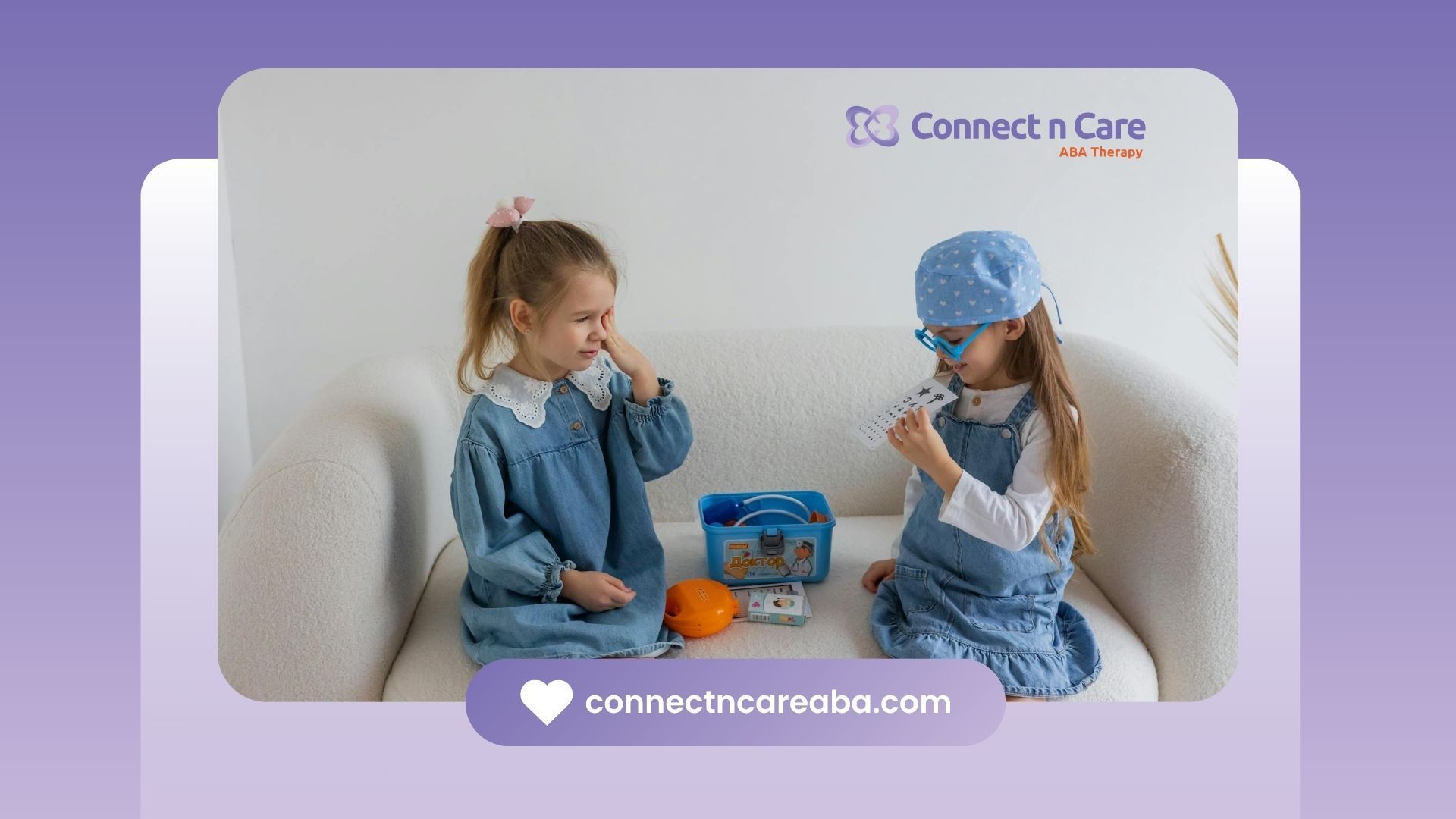 Two young autistic girls in denim dresses playing doctor with a toy medical kit on a couch in NC.