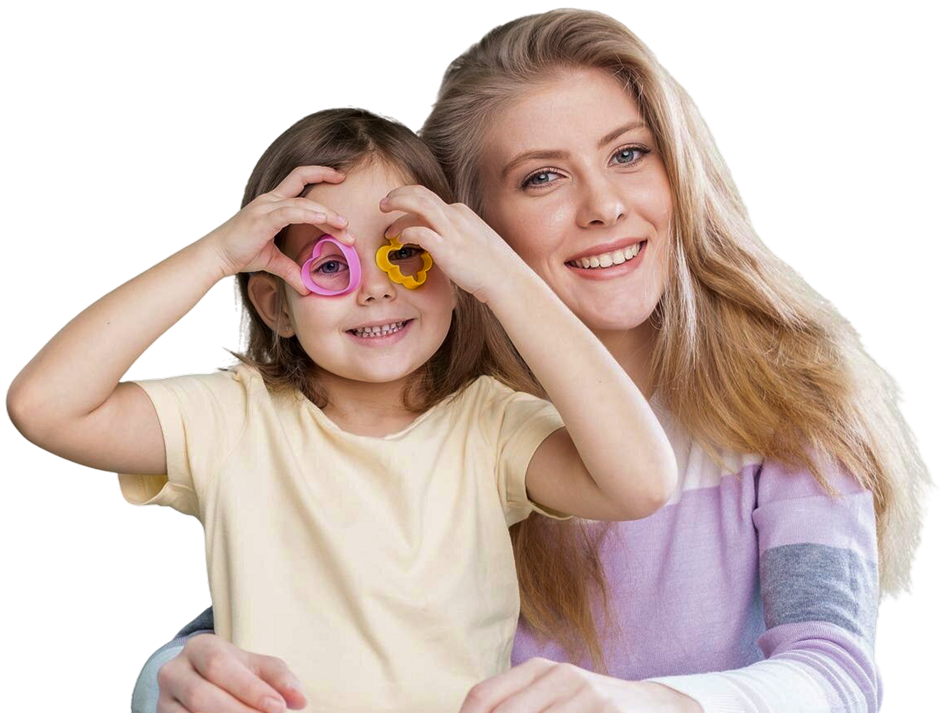 A woman and a child sitting on the floor reading a book