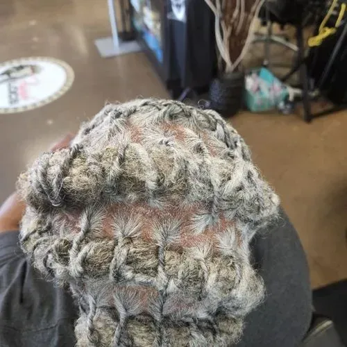 A close up of a person 's hair in a salon.