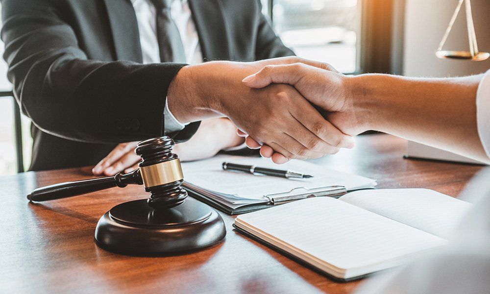 Attorney and businessman shaking hands — Warrendale, PA — Myers Law Group, LLC