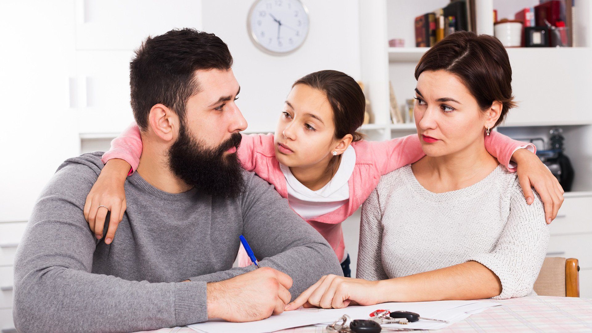 Young Sad Parents Signing Papers for Divorce — Warrendale, PA — Myers Law Group, LLC