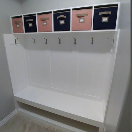Custom built coat hanger with storage above