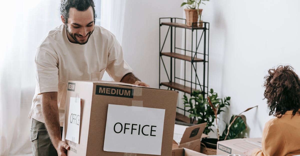 a man and a woman cleaning before an office move