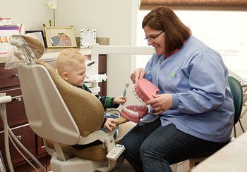 Dentist with Little Boy — Quincy, MI — Family Dental Home