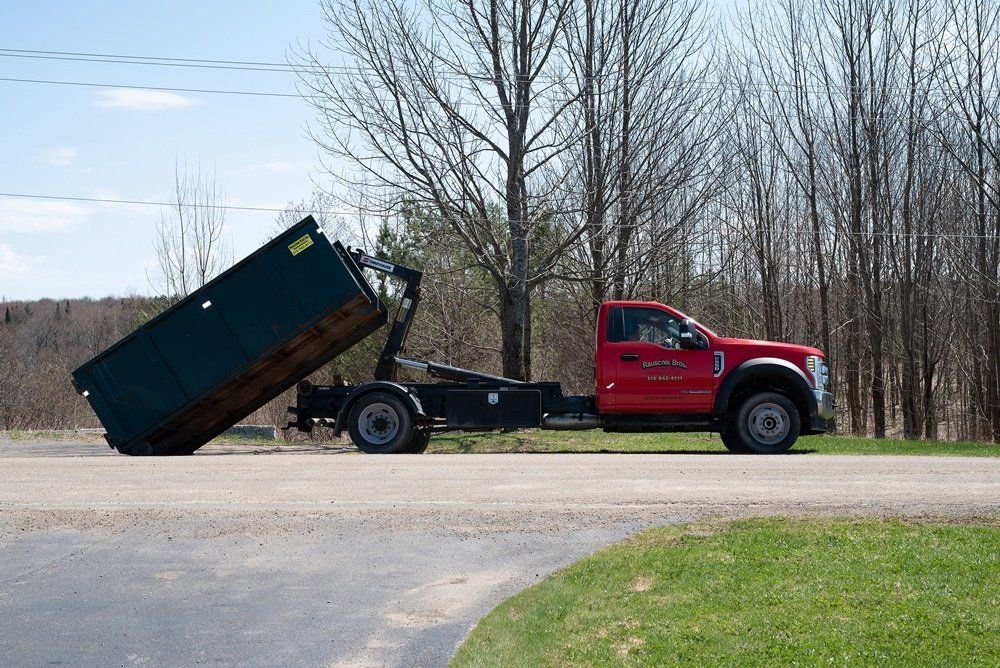 Business Disposal Vehicle On Road — West Leyden, NY — Rauscher Brothers Inc. Business Disposal Vehicle On Road — West Leyden, NY — Rauscher Brothers Inc.