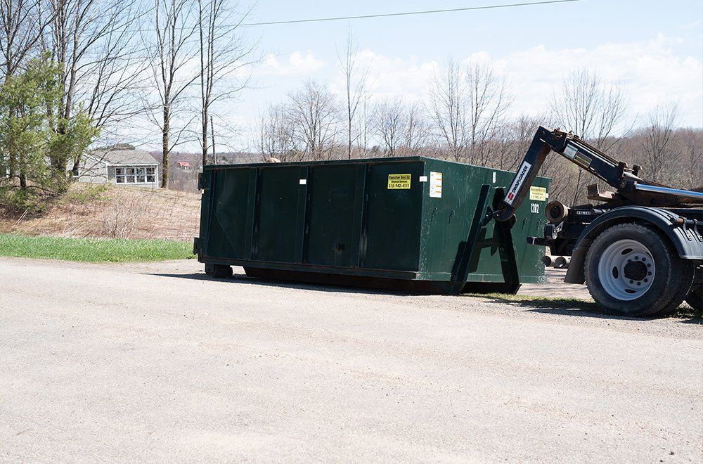 Collecting Trash From Dumpster — West Leyden, NY — Rauscher Brothers Inc.