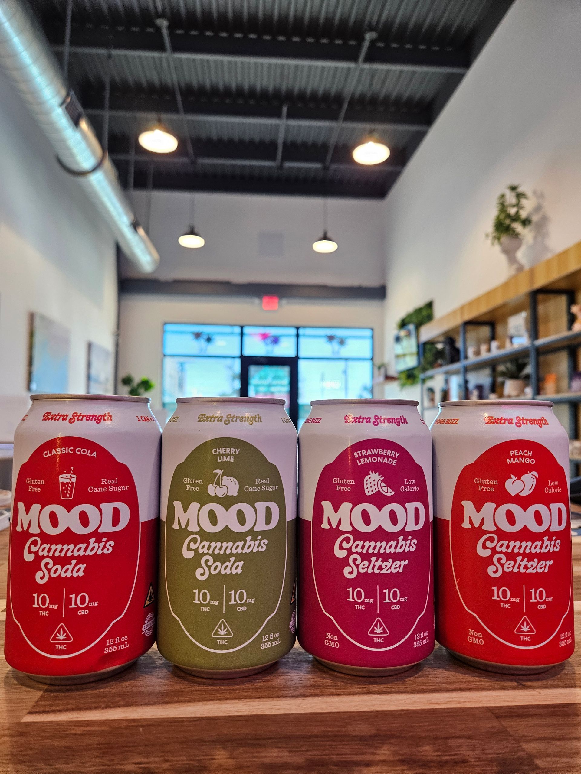 Mood hemp-derived Delta-9 THC 10 mg seltzers — assorted flavors — available in-store at High Tides CBD Corpus Christi, Texas.