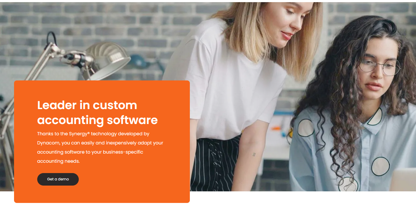 Two people collaborate at a desk next to an orange text box promoting custom accounting software.