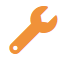 Une icône de clé orange représentant les paramètres ou la maintenance.