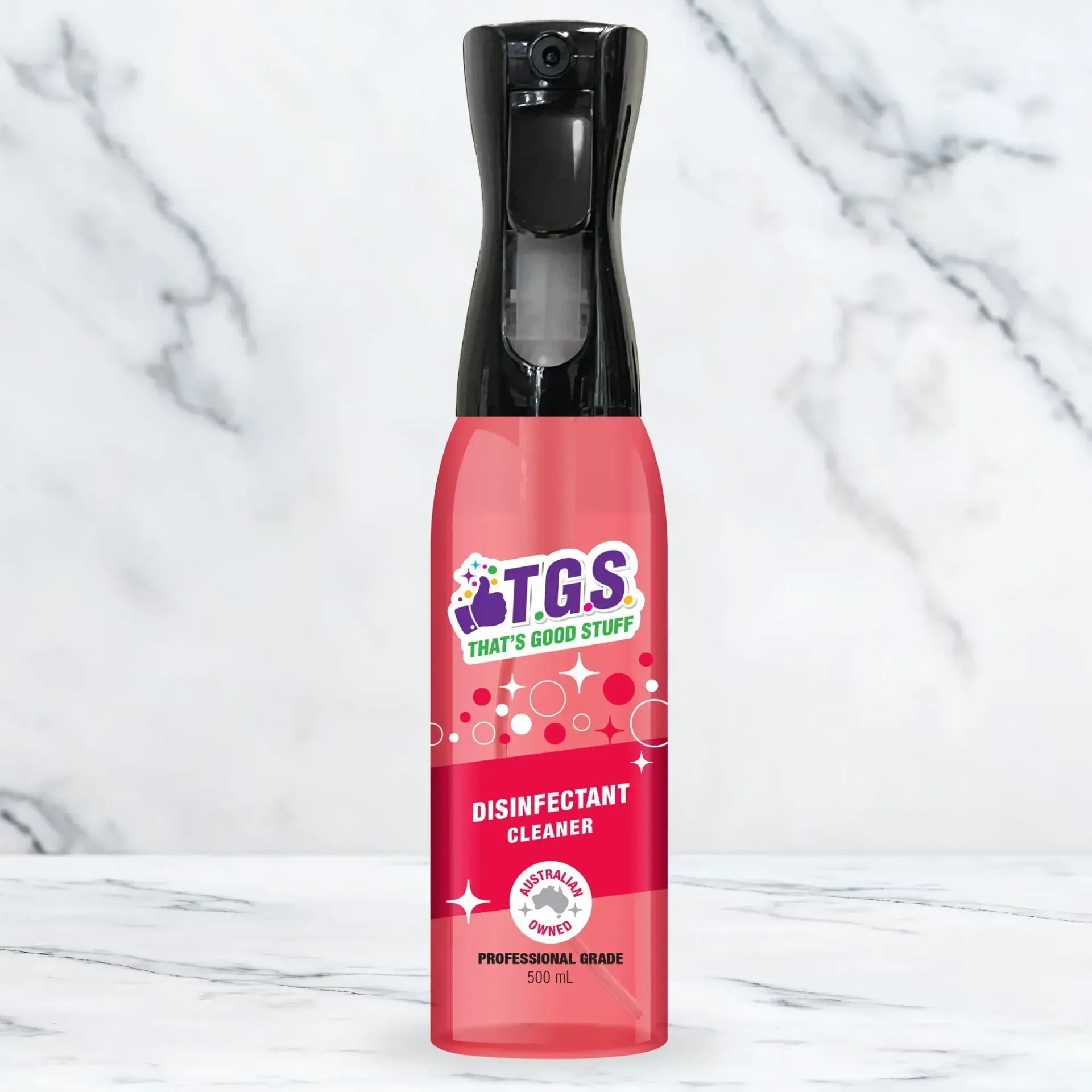 A bottle of tgs disinfectant cleaner is sitting on a marble surface.