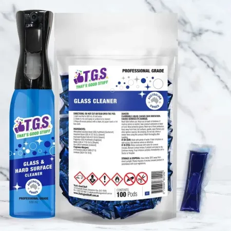 A bottle of tgs glass cleaner next to a bag of tgs glass cleaner
