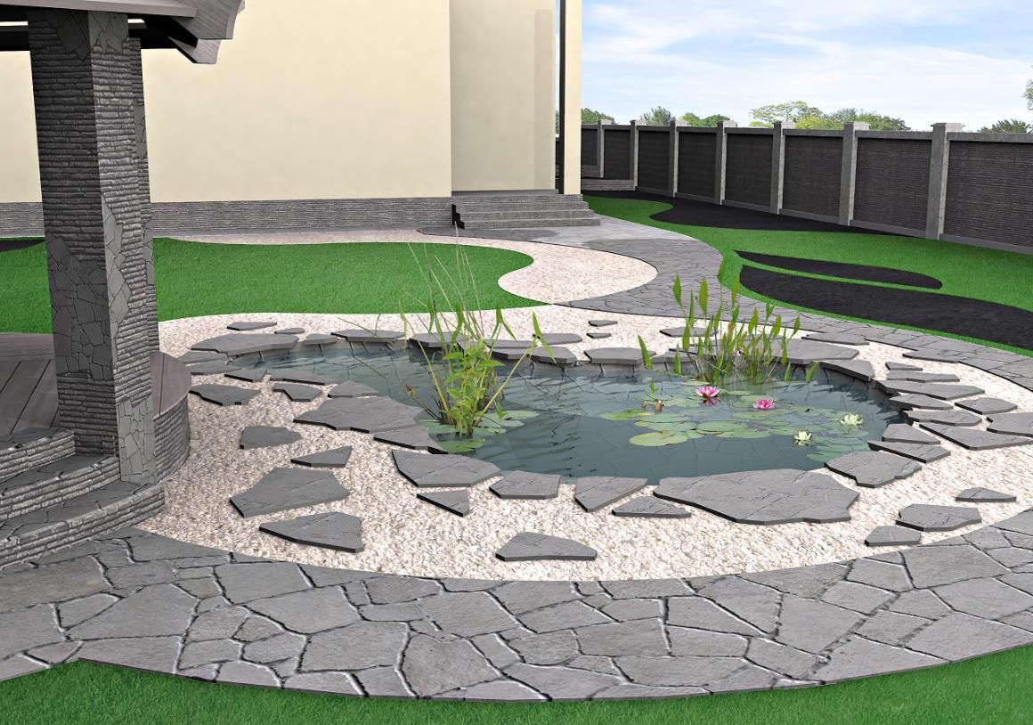 There is a pond in the middle of the garden surrounded by rocks.