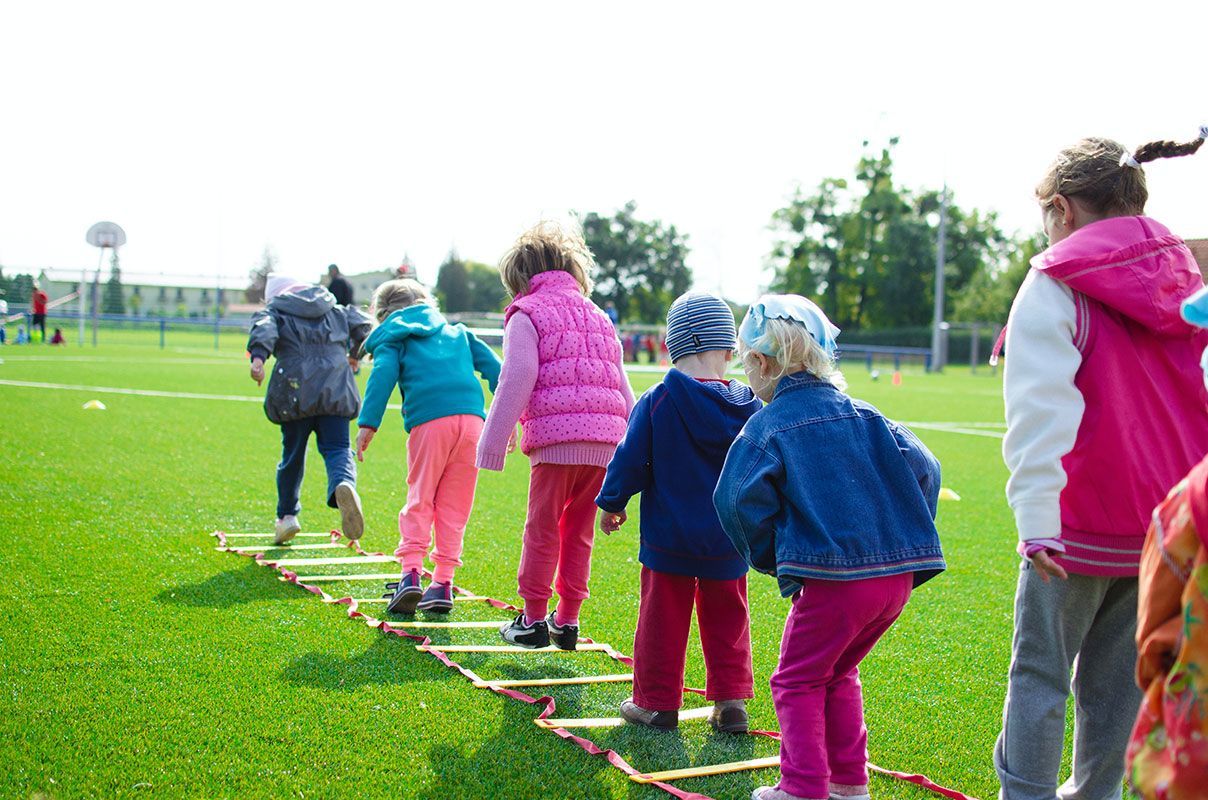 Children in winter clothing line up