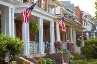 richmond row homes with american flags