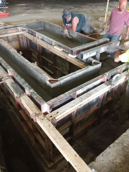 A group of men are working on a construction site.