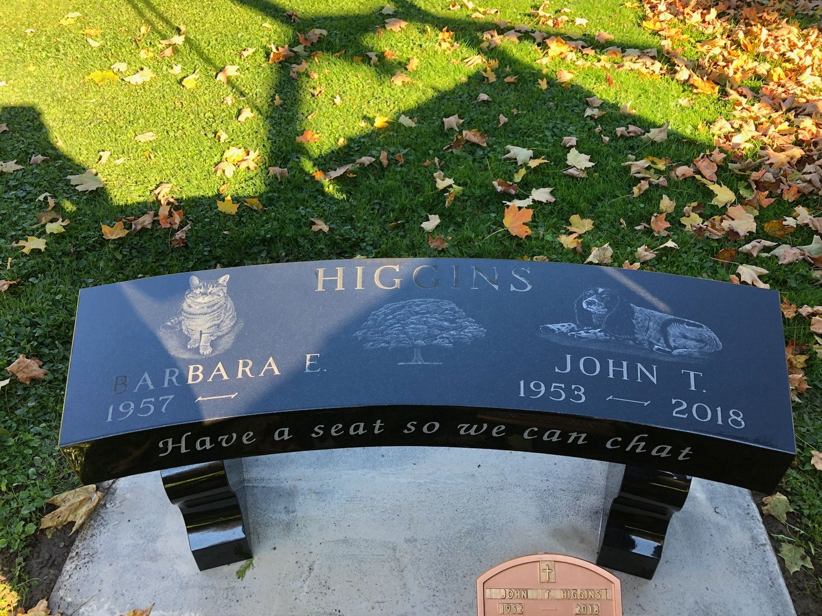 Black granite memorial bench with names