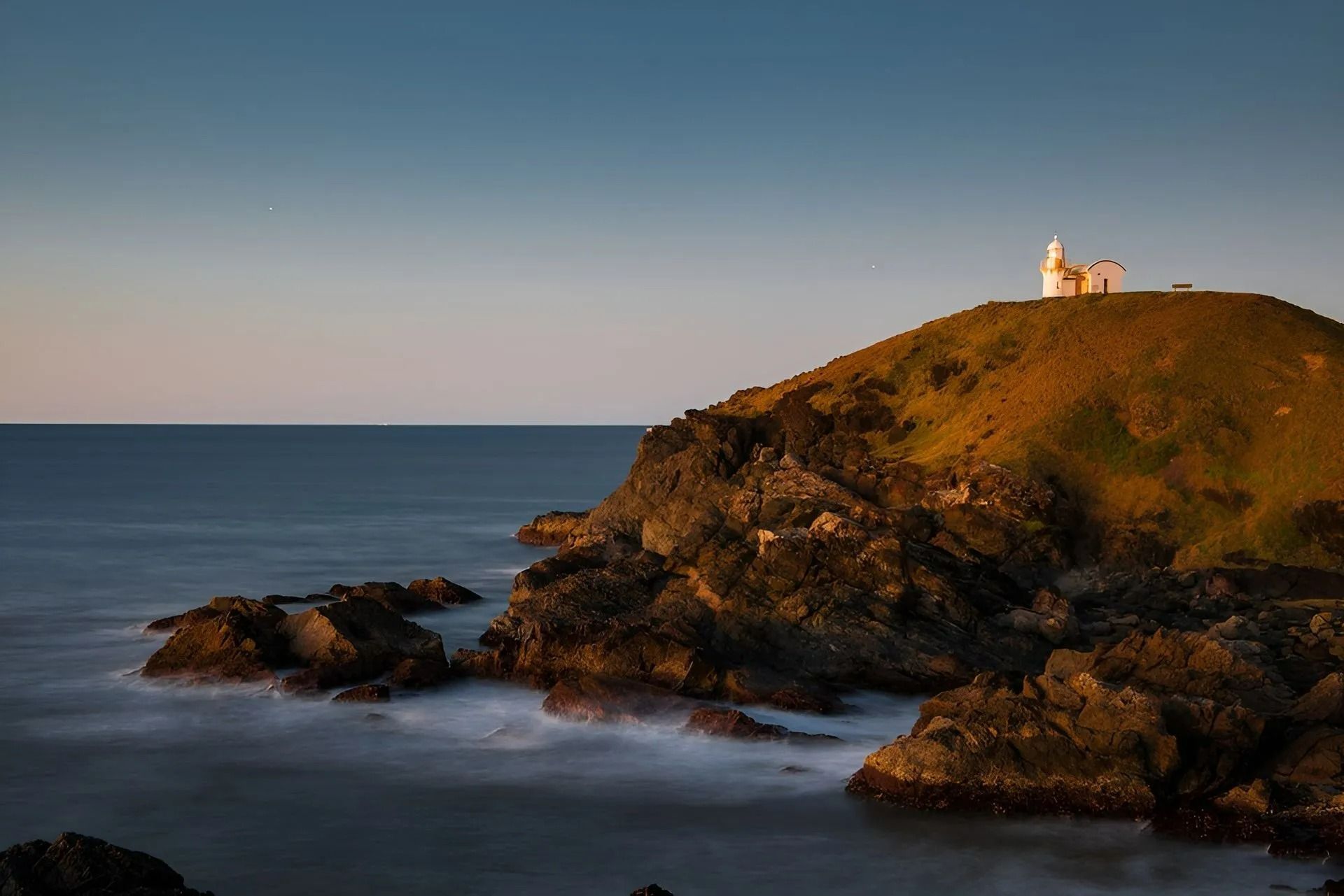 A Lighthouse on Top of A Hill Overlooking the Ocean — Oz-Craft in Port Macquarie, NSW