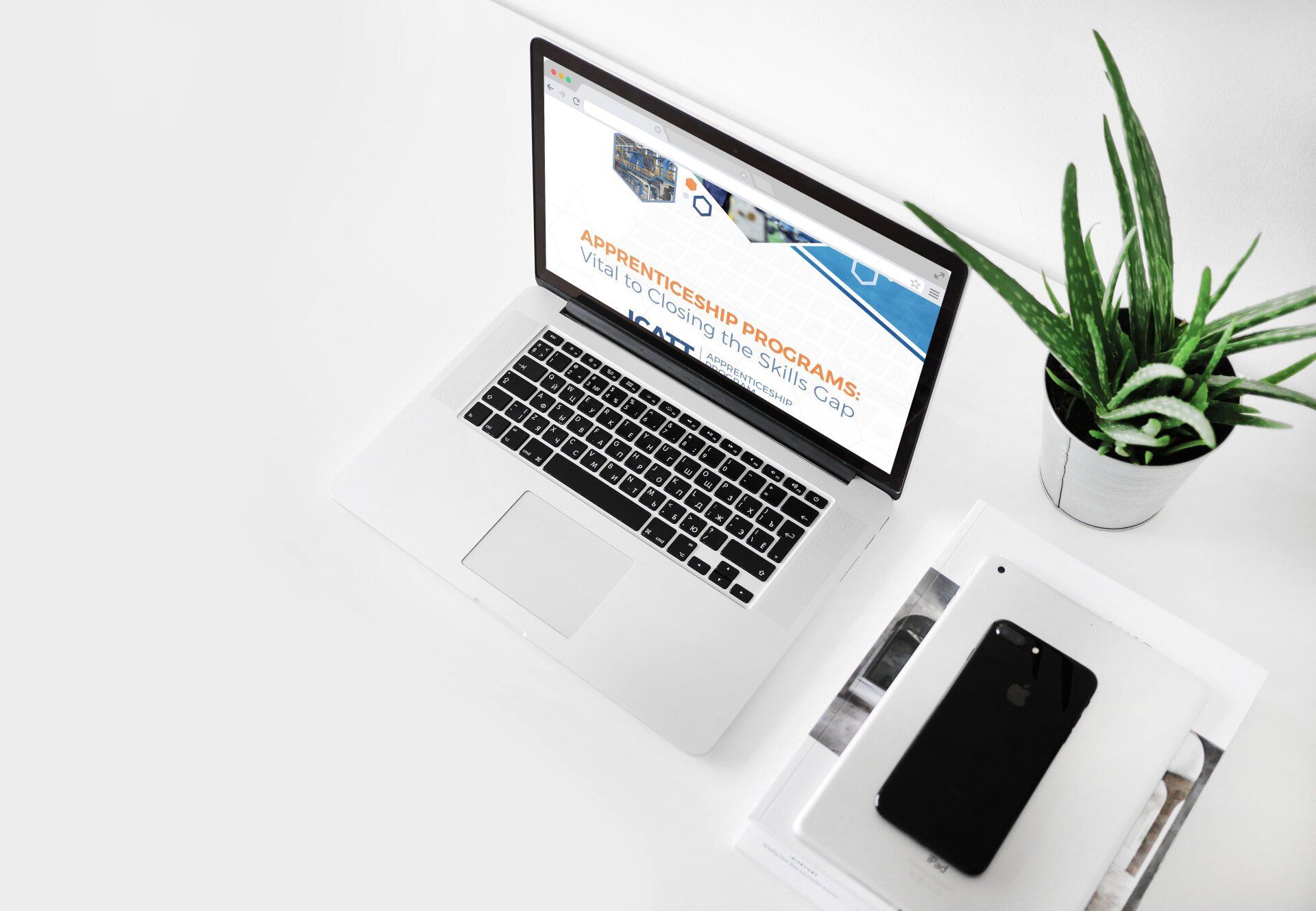 ICATT white paper on laptop screen