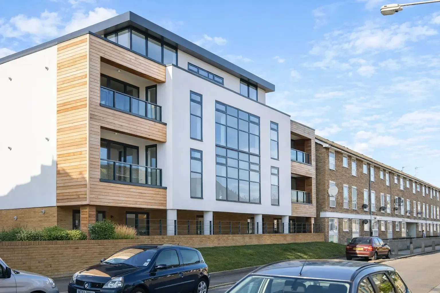 Contemporary mixed‑use development combining modern glazing with traditional brickwork in Brookwood SW18 – CSarchitects