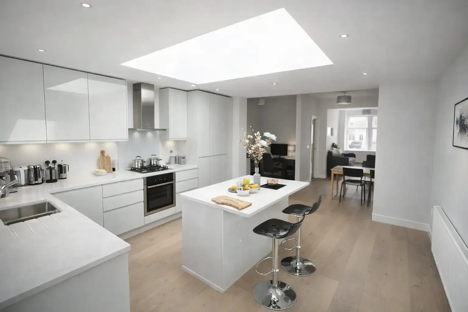 Open plan kitchen and dining space created through full house refurbishment, single‑storey extension and loft conversion in Raynes Park SW20 – CSarchitects