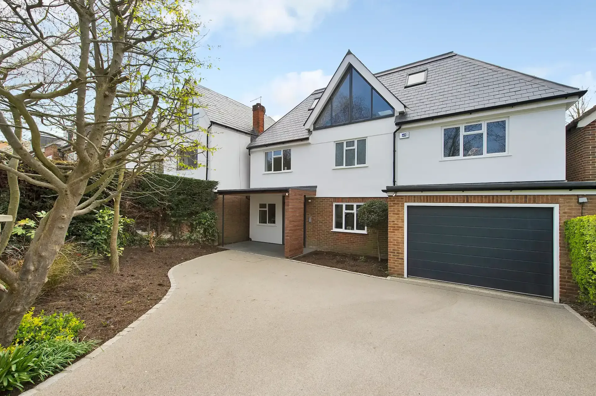 First‑floor infill extension with internal refurbishment and feature glazing in West Wimbledon SW20 – CSarchitects