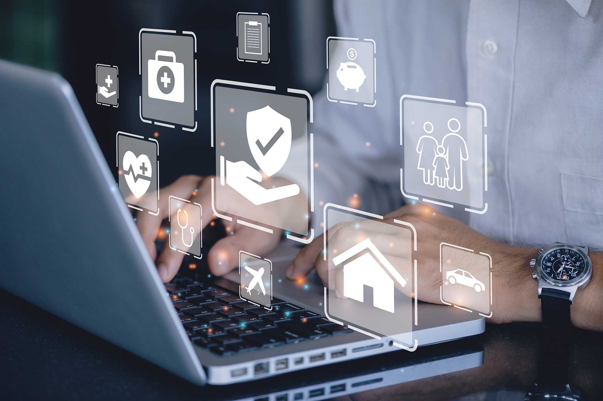 Businessman using a computer to insurance online for car, travel, family and life, financial and health insurance. Insurance concept.