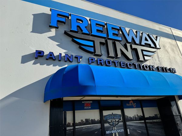 a freeway tint paint protection film store with a blue awning | Riverside, CA | Freeway Tint