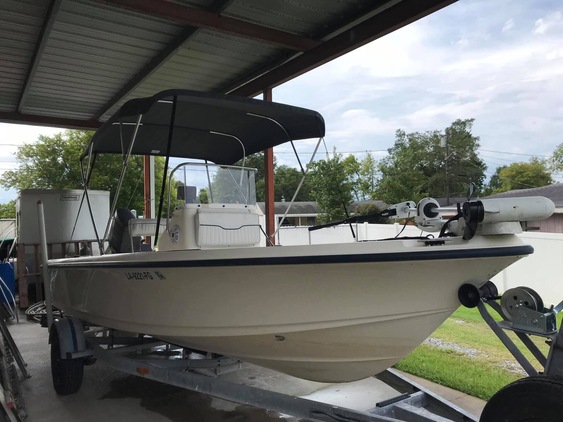 White boat – Houma, LA – Darcey’s Upholstery and Glass